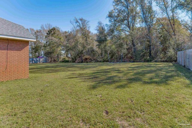 9348 Bell Ridge Dr, Pensacola, FL 32526 - view of yard featuring fence