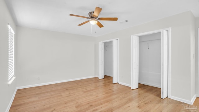 unfurnished bedroom featuring ceiling fan and light wood-type flooring