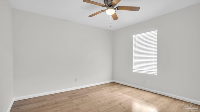 unfurnished room with ceiling fan and light wood-type flooring