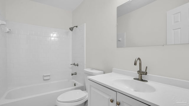 full bathroom featuring vanity, toilet, and tiled shower / bath