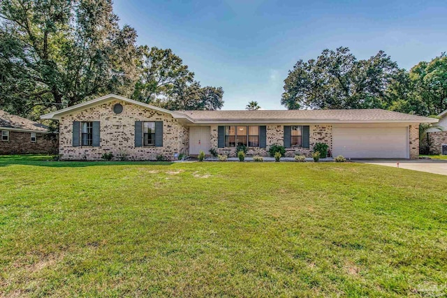 ranch-style home with a garage and a front lawn