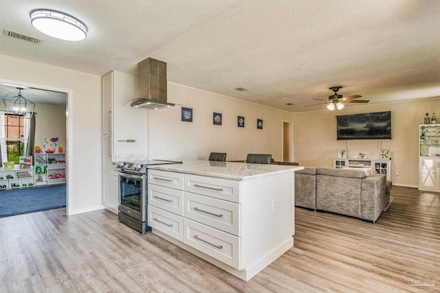 kitchen featuring white cabinets, a textured ceiling, extractor fan, stainless steel electric stove, and light wood-type flooring