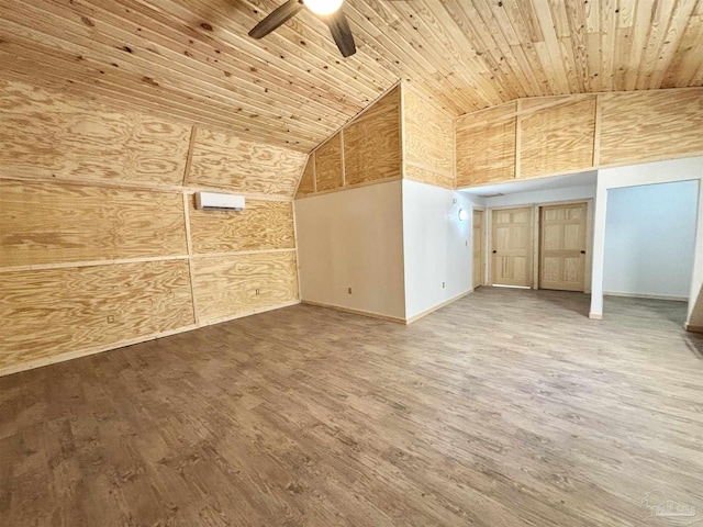 additional living space featuring lofted ceiling, wood finished floors, wood ceiling, and a ceiling fan