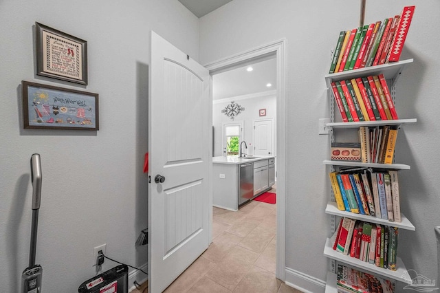 3209 Mountain Laurel Trl, Cantonment, FL 32533 - hall featuring a sink and light tile patterned flooring