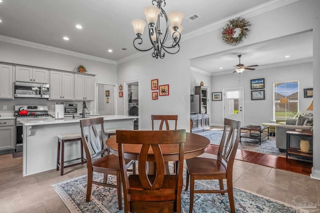 3209 Mountain Laurel Trl, Cantonment, FL 32533 - dining space with recessed lighting, light tile patterned floors, ceiling fan, ornamental molding, and a chandelier