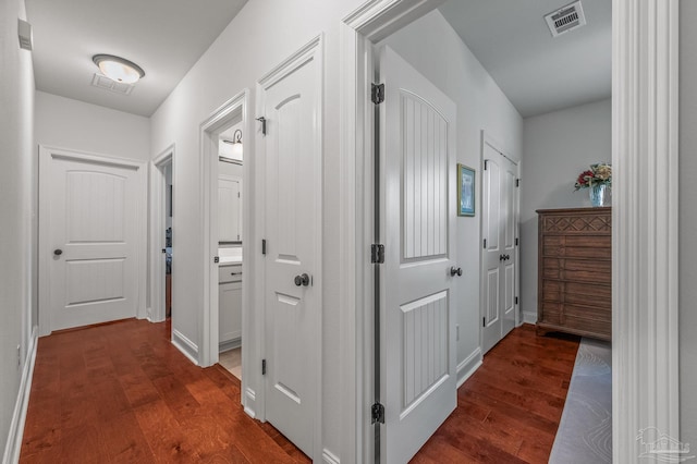3209 Mountain Laurel Trl, Cantonment, FL 32533 - corridor featuring dark wood-type flooring and baseboards