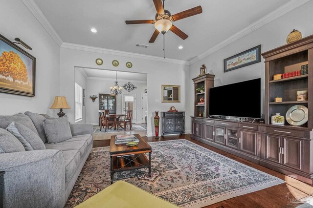 3209 Mountain Laurel Trl, Cantonment, FL 32533 - living room featuring ceiling fan, wood finished floors, a chandelier, ornamental molding, and recessed lighting