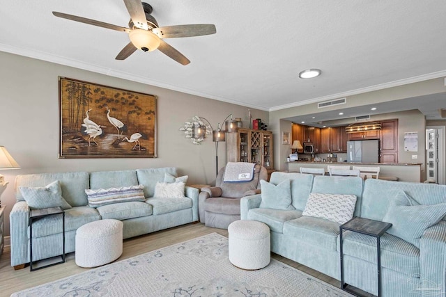 616 Lost Key Dr Unit 902A, Perdido Key, FL 32507 - living room featuring ornamental molding, light wood-style flooring, ceiling fan, and recessed lighting