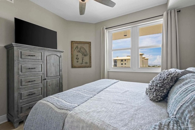 616 Lost Key Dr Unit 902A, Perdido Key, FL 32507 - bedroom featuring a ceiling fan and wood finished floors