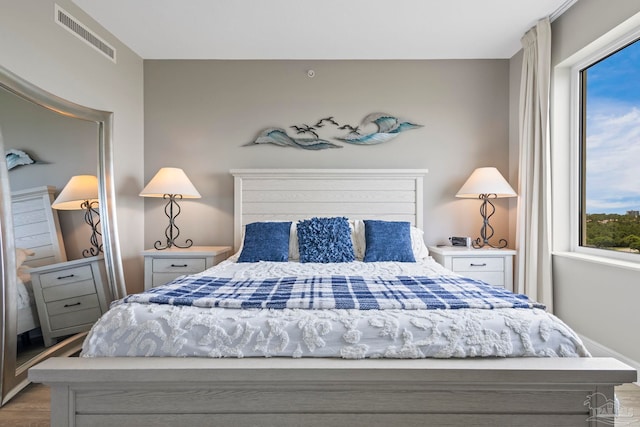 616 Lost Key Dr Unit 902A, Perdido Key, FL 32507 - bedroom with wood finished floors