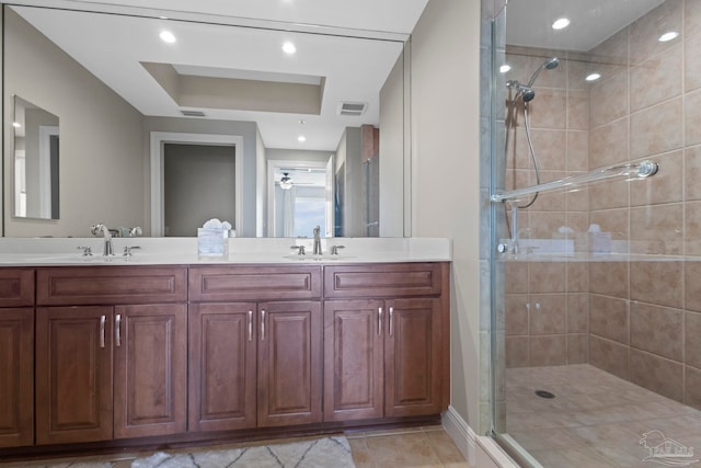 616 Lost Key Dr Unit 902A, Perdido Key, FL 32507 - bathroom with a stall shower, double vanity, and tile patterned floors