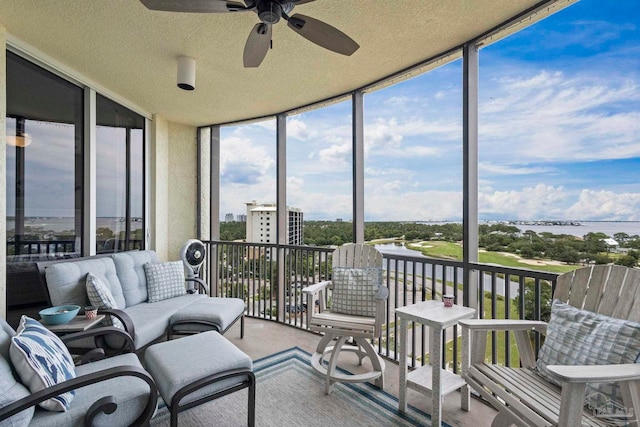 616 Lost Key Dr Unit 902A, Perdido Key, FL 32507 - sunroom / solarium with floor to ceiling windows, ceiling fan, and a textured ceiling