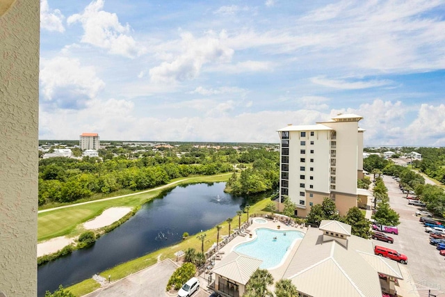 616 Lost Key Dr Unit 902A, Perdido Key, FL 32507 - drone / aerial view of a nearby body of water, a pool area, and a tree filled landscape