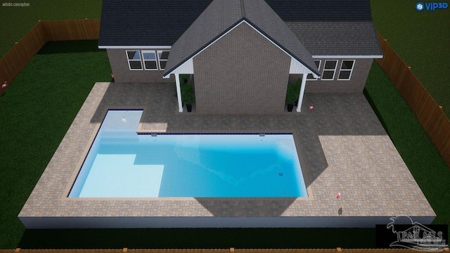 view of pool featuring a yard