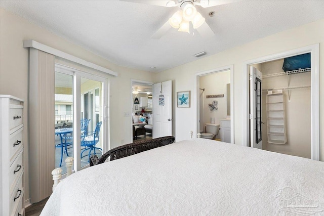 bedroom with a closet, connected bathroom, a textured ceiling, access to exterior, and ceiling fan