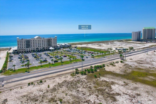 aerial view featuring a beach view and a water view