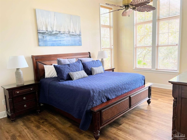 9351 Savane Park, Gulf Shores, AL 36542 - bedroom with ceiling fan, hardwood / wood-style flooring, and multiple windows