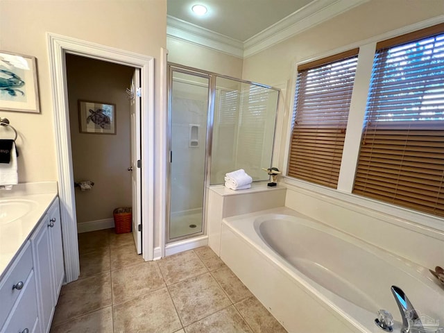 9351 Savane Park, Gulf Shores, AL 36542 - bathroom featuring vanity, ornamental molding, plus walk in shower, and tile patterned flooring