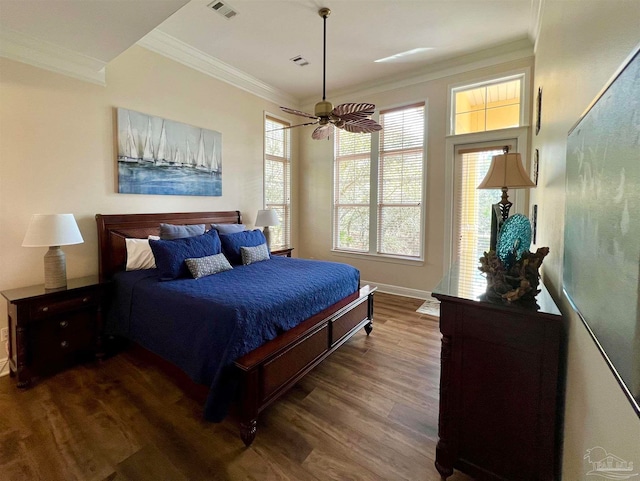 9351 Savane Park, Gulf Shores, AL 36542 - bedroom featuring ornamental molding, dark wood-type flooring, and ceiling fan