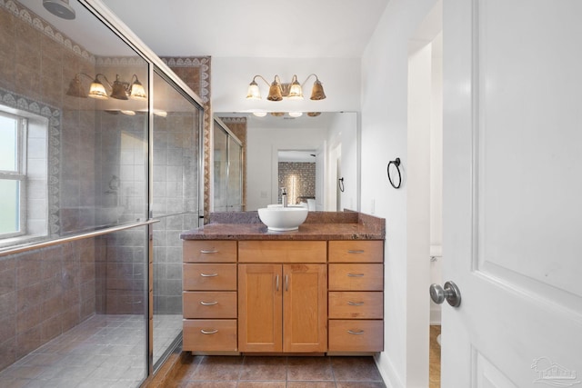 bathroom with vanity and an enclosed shower