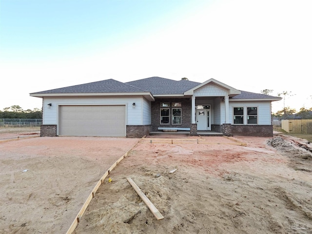 view of front of house with a garage