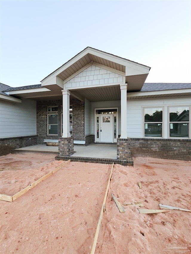 view of front of house featuring covered porch