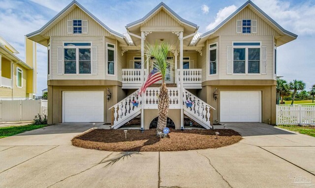 view of front of property featuring a garage and covered porch