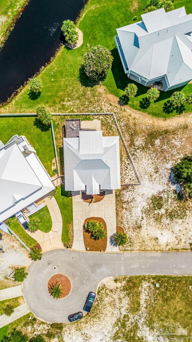 bird's eye view with a water view