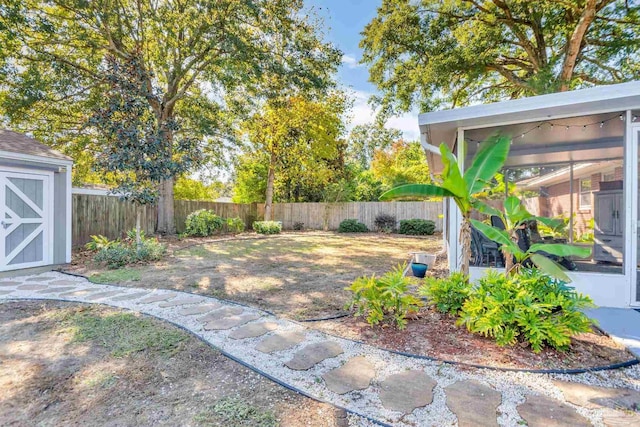 view of yard with a sunroom