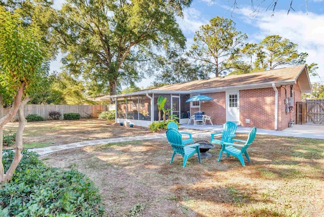 exterior space featuring a sunroom