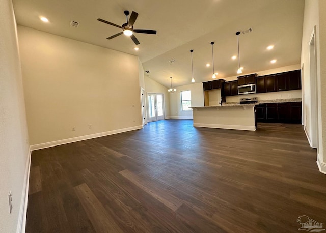 unfurnished living room with high vaulted ceiling, dark hardwood / wood-style floors, and ceiling fan