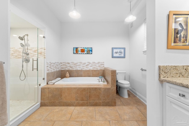 full bathroom featuring vanity, shower with separate bathtub, tile patterned flooring, and toilet