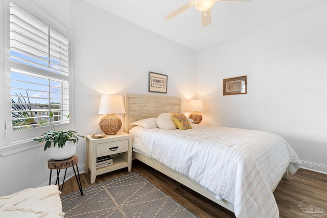 bedroom featuring ceiling fan and hardwood / wood-style floors