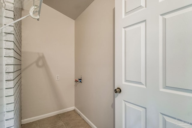 washroom featuring light tile patterned flooring