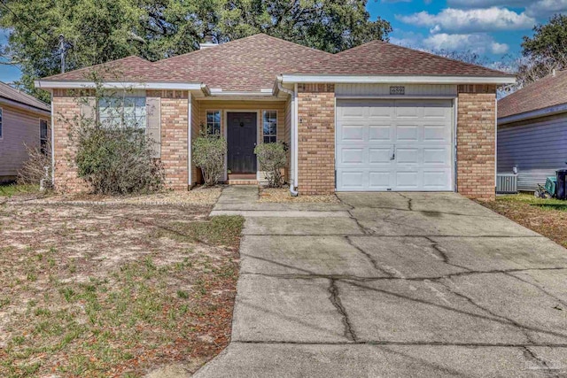 ranch-style home with a garage