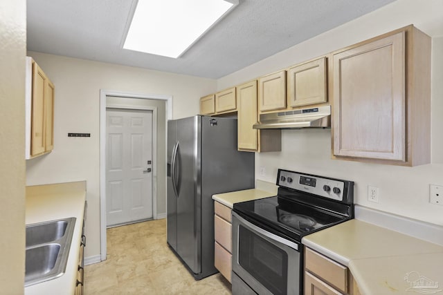 kitchen featuring sink, stainless steel appliances, and light brown cabinets