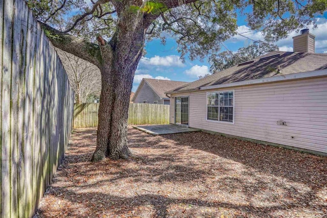 view of yard with a patio area