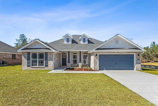 6575 Gentle Rain Dr, Milton, FL 32570 - craftsman inspired home featuring brick siding, an attached garage, central AC unit, a front lawn, and concrete driveway