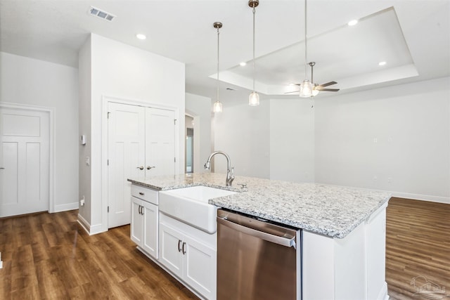 6575 Gentle Rain Dr, Milton, FL 32570 - kitchen with dishwasher, a sink, a tray ceiling, dark wood-style flooring, and ceiling fan