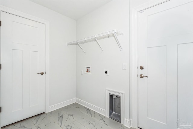 6575 Gentle Rain Dr, Milton, FL 32570 - laundry room with light marble finish floors, electric dryer hookup, hookup for a washing machine, and baseboards