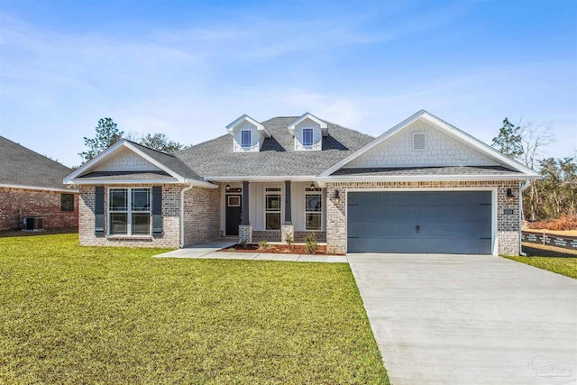 6575 Gentle Rain Dr, Milton, FL 32570 - craftsman inspired home with a garage, a front yard, a shingled roof, driveway, and brick siding
