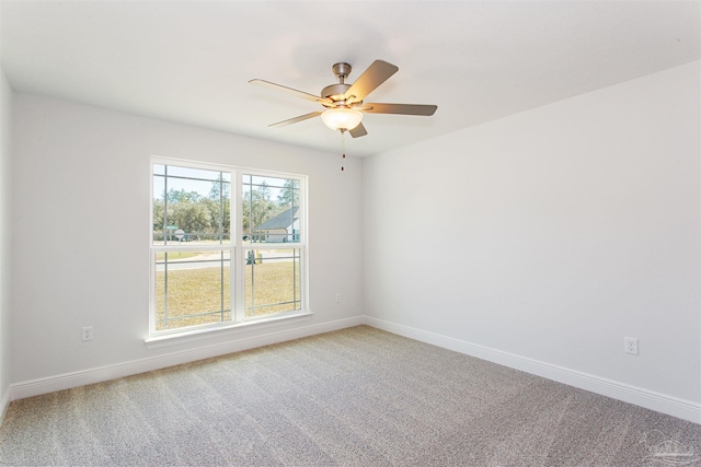 6575 Gentle Rain Dr, Milton, FL 32570 - spare room with ceiling fan, light colored carpet, and baseboards