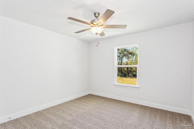 6575 Gentle Rain Dr, Milton, FL 32570 - carpeted empty room with baseboards and a ceiling fan