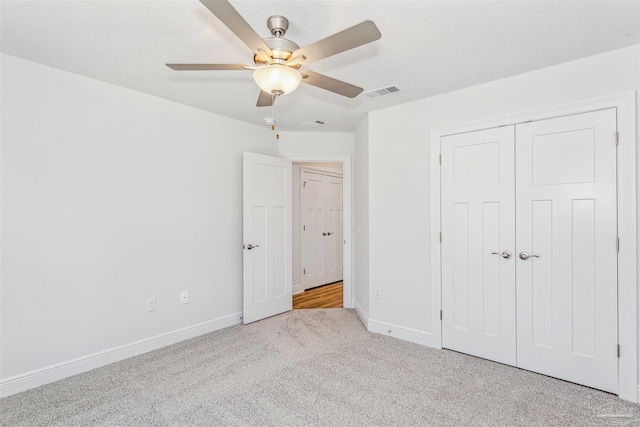 6575 Gentle Rain Dr, Milton, FL 32570 - unfurnished bedroom featuring carpet floors, baseboards, a closet, and ceiling fan