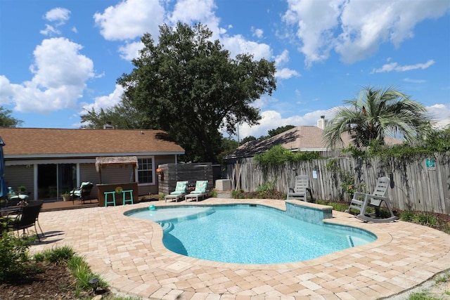 view of swimming pool featuring a patio