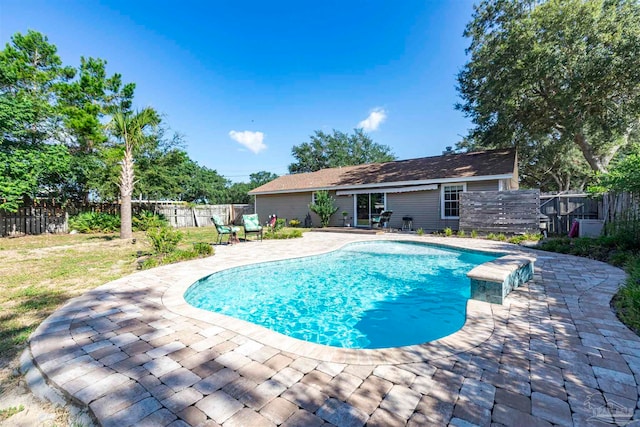 view of pool featuring a patio area