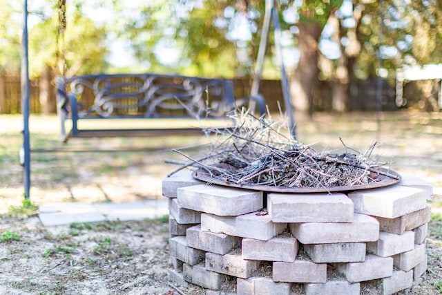 details featuring an outdoor fire pit