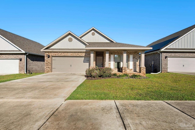 view of front of home with covered porch, a front yard, and a garage