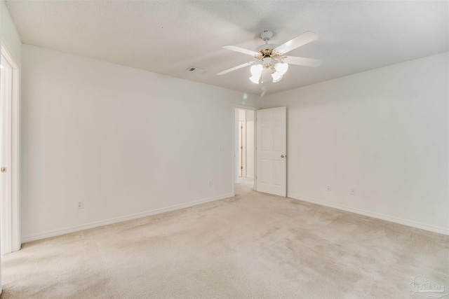 1537 Sandcliff Dr, Pensacola, FL 32507 - spare room with light carpet, ceiling fan, and baseboards