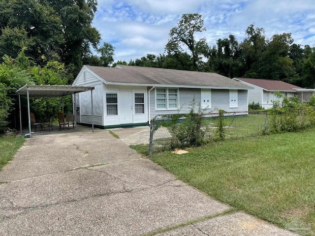 single story home featuring a front yard